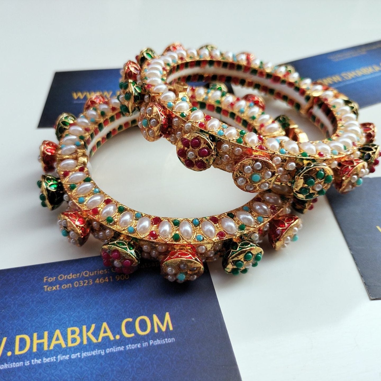 Studded Pearls in Multi Color with White pearls Kundan Bangles pair openable