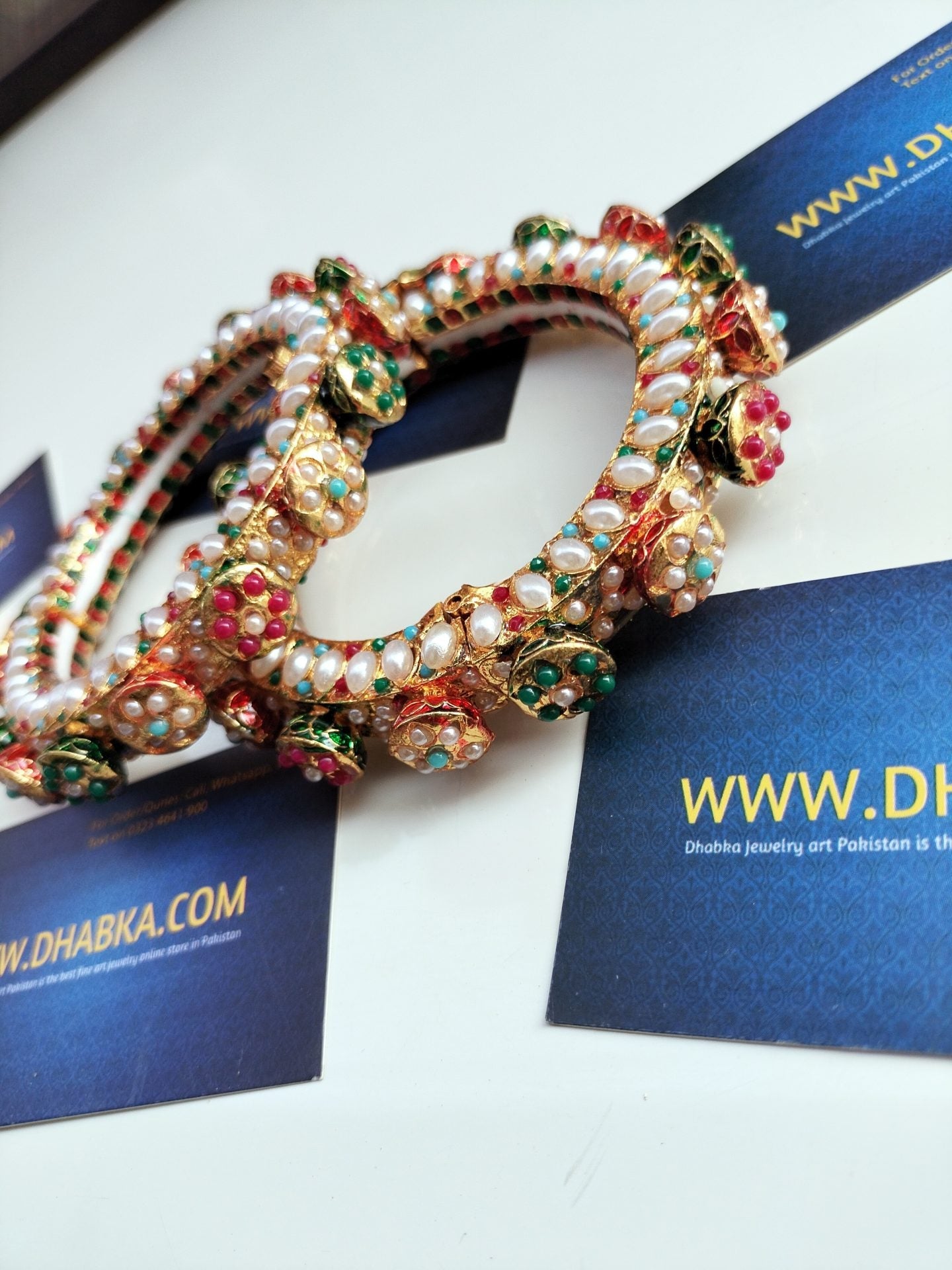 Studded Pearls in Multi Color with White pearls Kundan Bangles pair openable